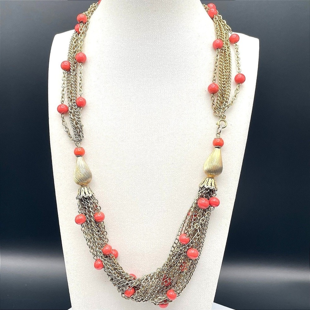 Vintage Multi-strand gold-tone chain necklace with red beads and tassel accents